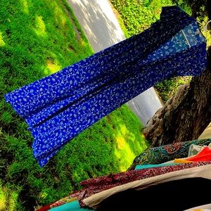 Long blue dress ties on the left side wrap around short sleeves